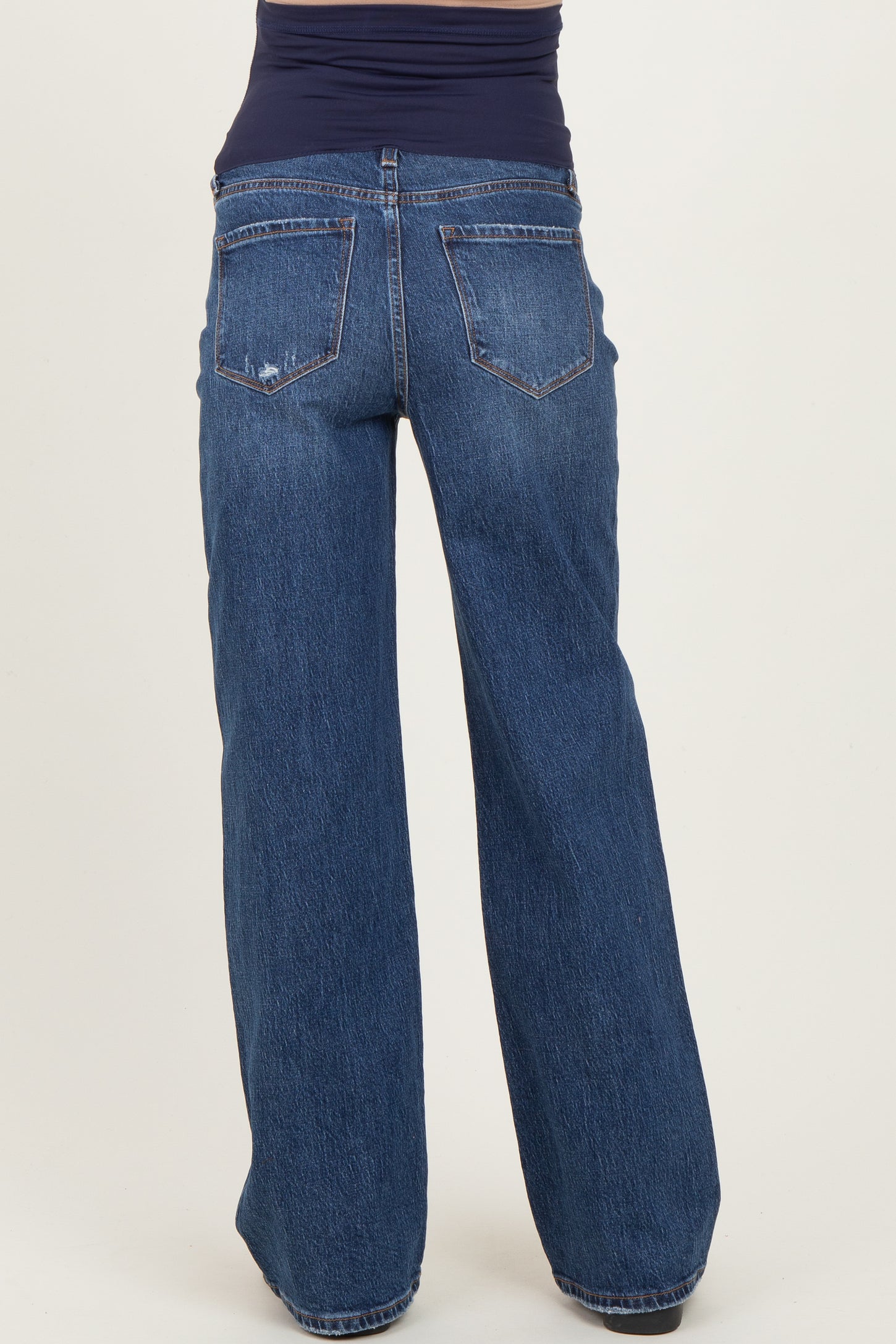 maternity wear dark blue wide leg jeans with a high waistband, shown from the back