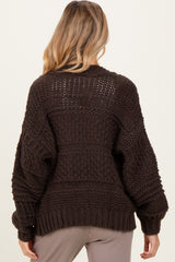 maternity wear dark brown chunky knit sweater with oversized fit and textured detail, shown from the back