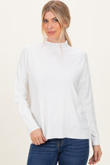Ivory Mock Neck Exposed Seam Sweater