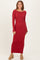 woman wearing a long red ribbed maxi dress with long sleeves and a scoop neckline