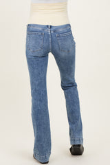 maternity wear light blue flared jeans shown from the back