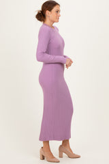 woman wearing a long sleeve ribbed lavender maxi dress and beige heels