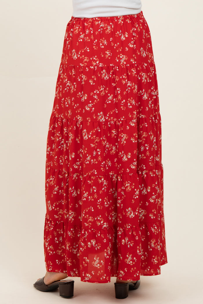 maternity wear red floral maxi skirt with tiered design, model seen from the back, wearing comfortable sandals