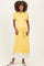 woman wearing a yellow ribbed maternity dress with a tie waist and white striped detailing at the hem