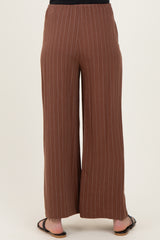 maternity wear brown wide leg pants with vertical stripes, shown from the back