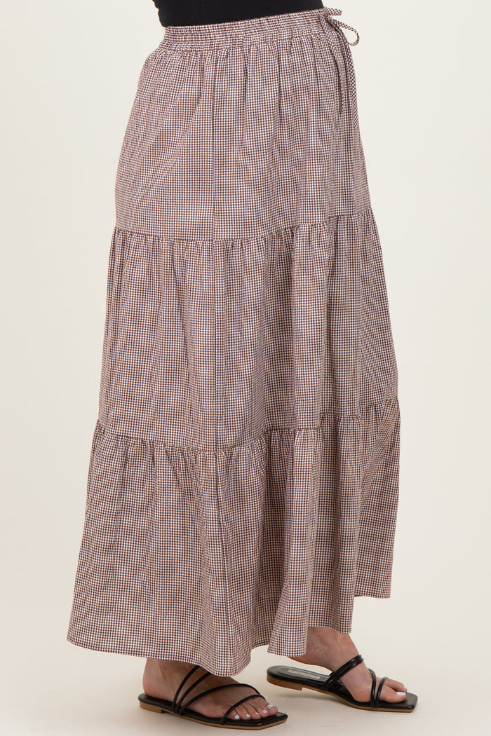 maternity wear brown gingham tiered maxi skirt with elastic waistband, model wearing black sandals