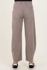 maternity wear in soft gray wide-leg pants with an elastic waistband and back pockets, shown from the back