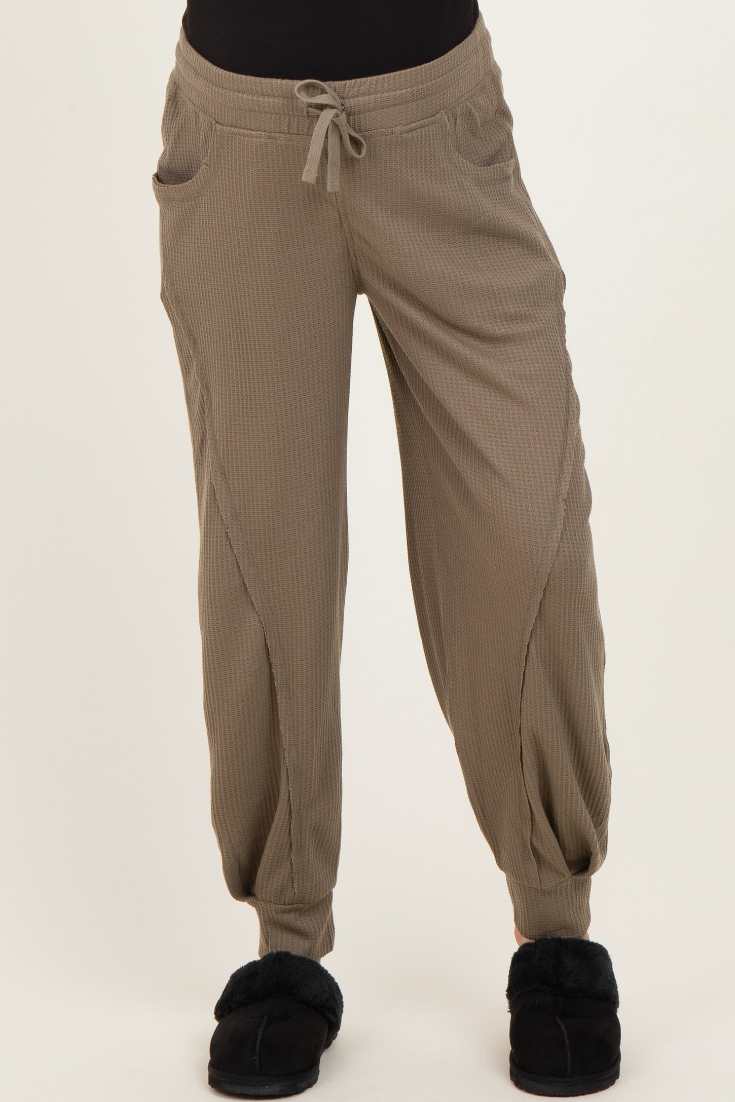 maternity wear in light brown ribbed jogger pants with side pockets and a drawstring waist