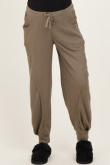 maternity wear in light brown ribbed jogger pants with side pockets and a drawstring waist