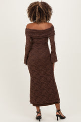 woman wearing a brown off-shoulder lace maternity dress with bell sleeves and a fitted silhouette