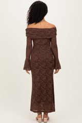 woman wearing a brown off-the-shoulder lace dress with bell sleeves, showing the back view