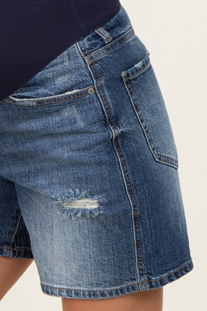 maternity denim shorts in medium wash with distressed detailing and a relaxed fit