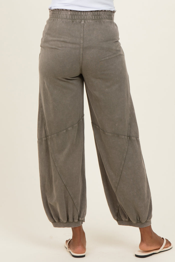 woman wearing gray maternity jogger pants with a relaxed fit and gathered cuffs, view from the back