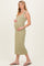 woman wearing a light olive green midi maternity dress, holding her baby bump
