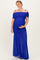 woman wearing a royal blue off-the-shoulder maternity dress with ruched details and a visible baby bump