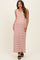 woman wearing a red and white striped maternity maxi dress with a v-neckline and a relaxed fit