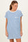 woman wearing a white and blue striped t-shirt dress with a pocket on the chest