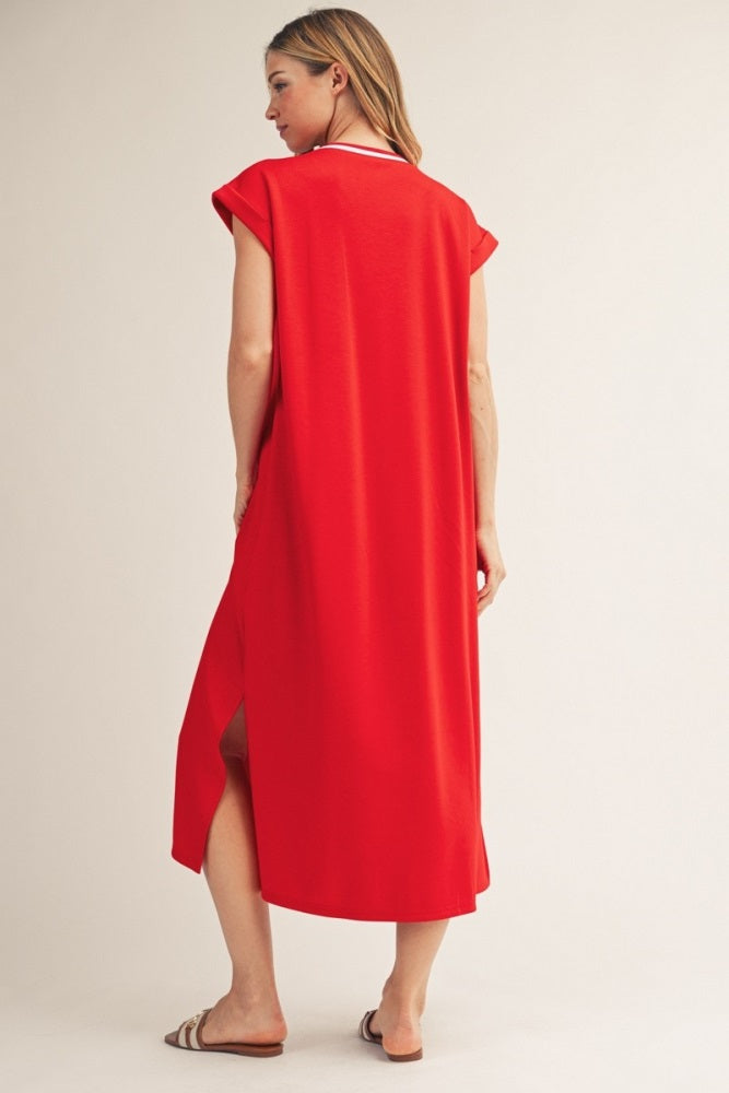 woman wearing a red cap sleeve maxi dress with side slits and a relaxed fit