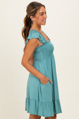 Sage Smocked Tiered Mini Dress