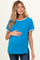woman wearing a bright blue maternity t-shirt with contrasting trim and holding her baby bump