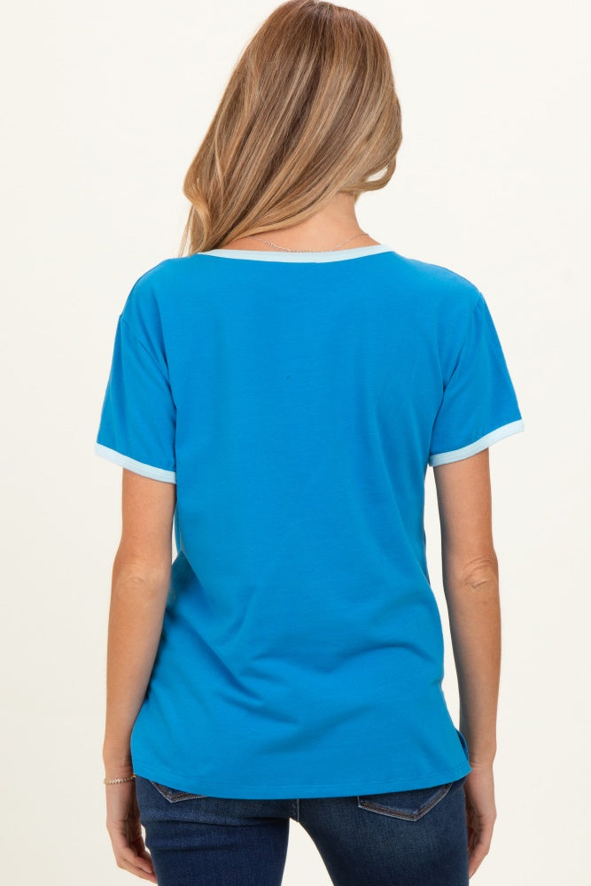woman wearing a bright blue maternity t-shirt with white trim, viewed from the back