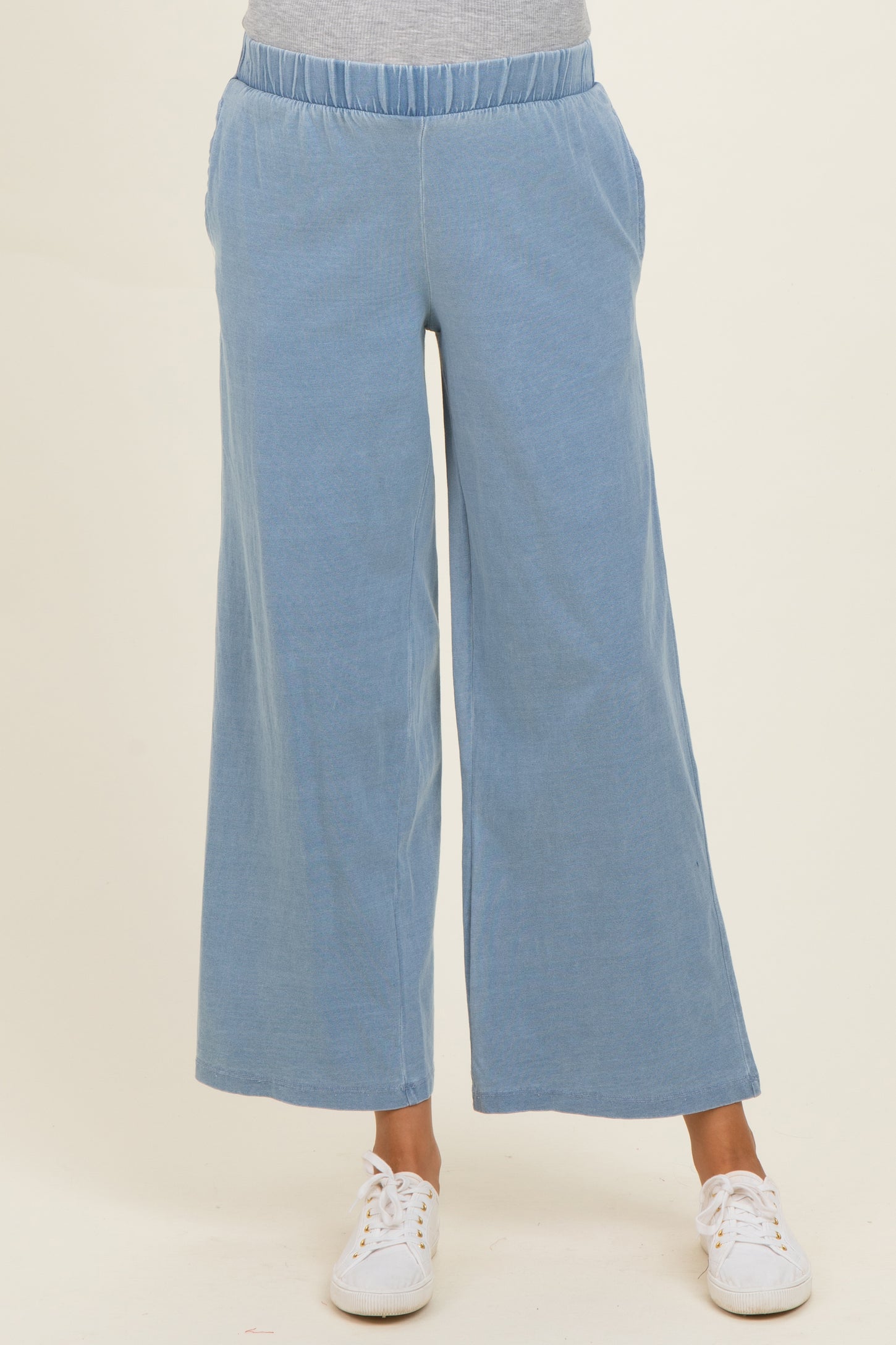 maternity wear in light blue wide-leg pants with an elastic waistband and side pockets, model not shown