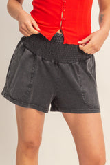 Black Smocked Waist Mineral Wash Shorts
