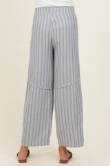 woman wearing blue and white striped wide-leg maternity pants, viewed from the back