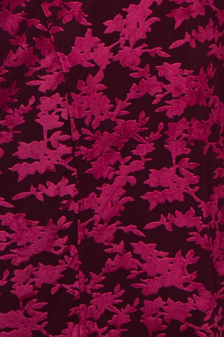 maternity wear in a burgundy fabric with a pink floral pattern