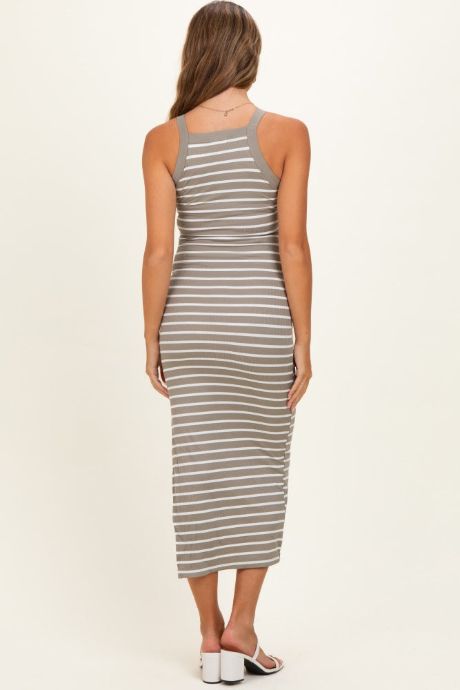 woman wearing a gray and white striped maternity maxi dress, view from the back