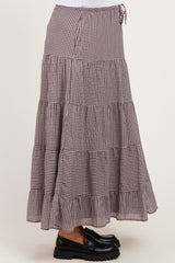 maternity wear brown and white tiered maxi skirt with ruffled hem and drawstring detail, model wearing black shoes