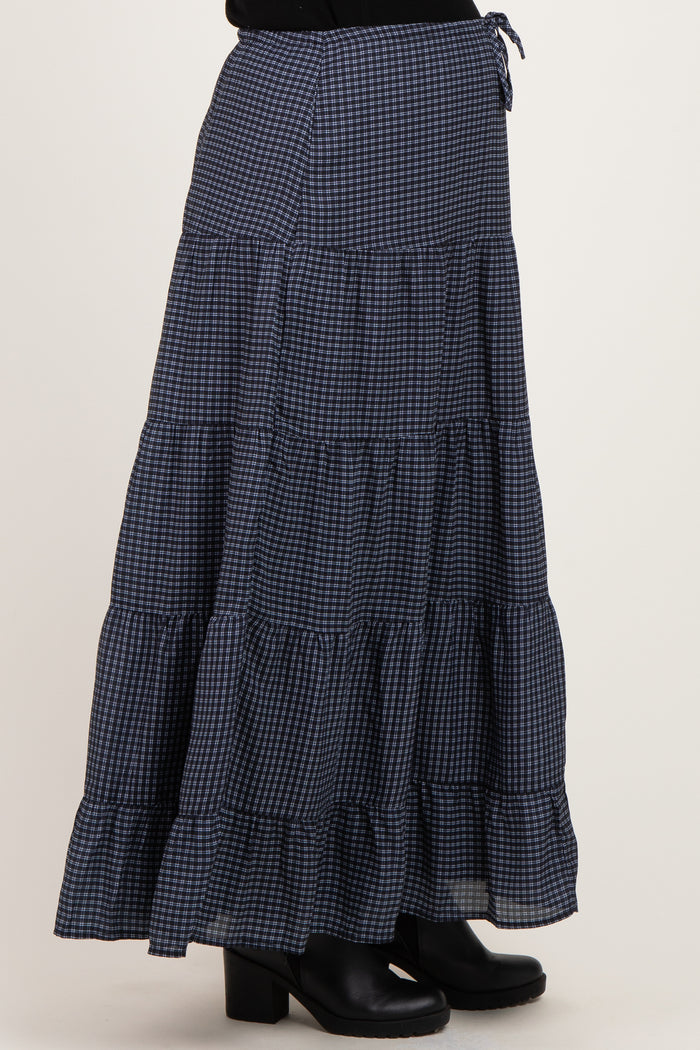 maternity wear navy blue gingham tiered maxi skirt with adjustable tie detail worn by a model