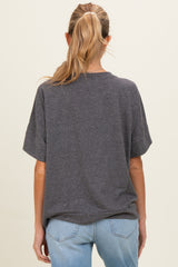 woman wearing a gray short sleeve maternity t-shirt with a relaxed fit, view from the back
