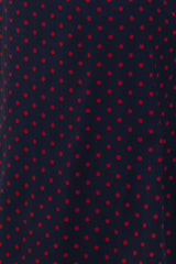 navy blue fabric with red polka dots pattern