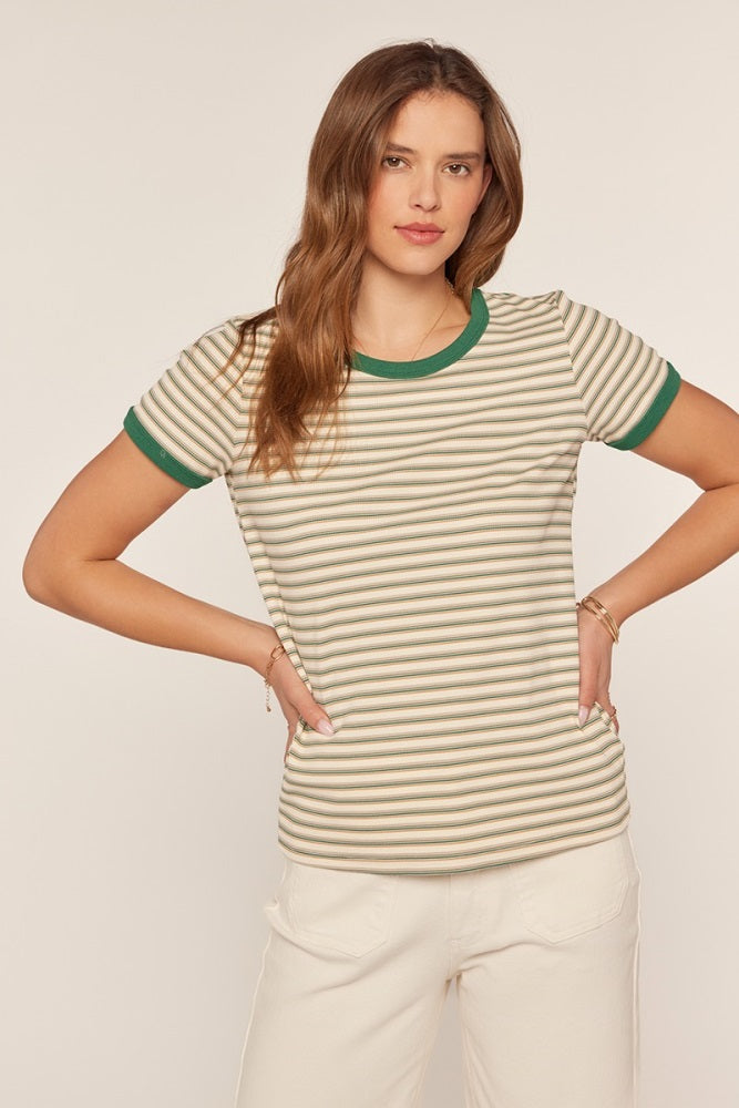 woman wearing a striped short sleeve t-shirt with green trim and a relaxed fit