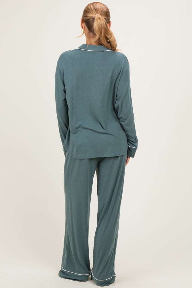 woman wearing a teal long sleeve top and matching wide-leg pants, viewed from the back