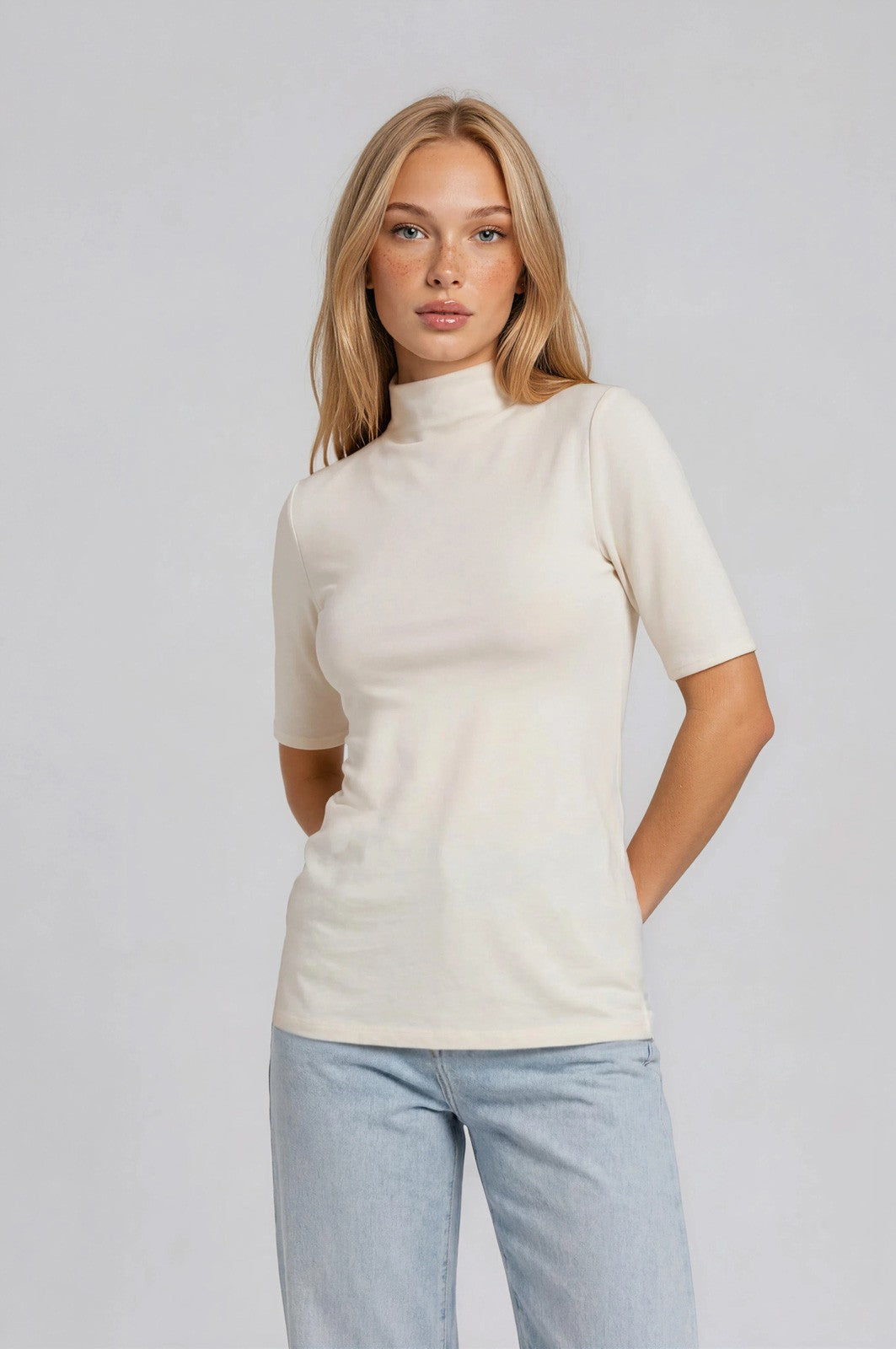 Ivory Funnel Neck Elbow Sleeve Top