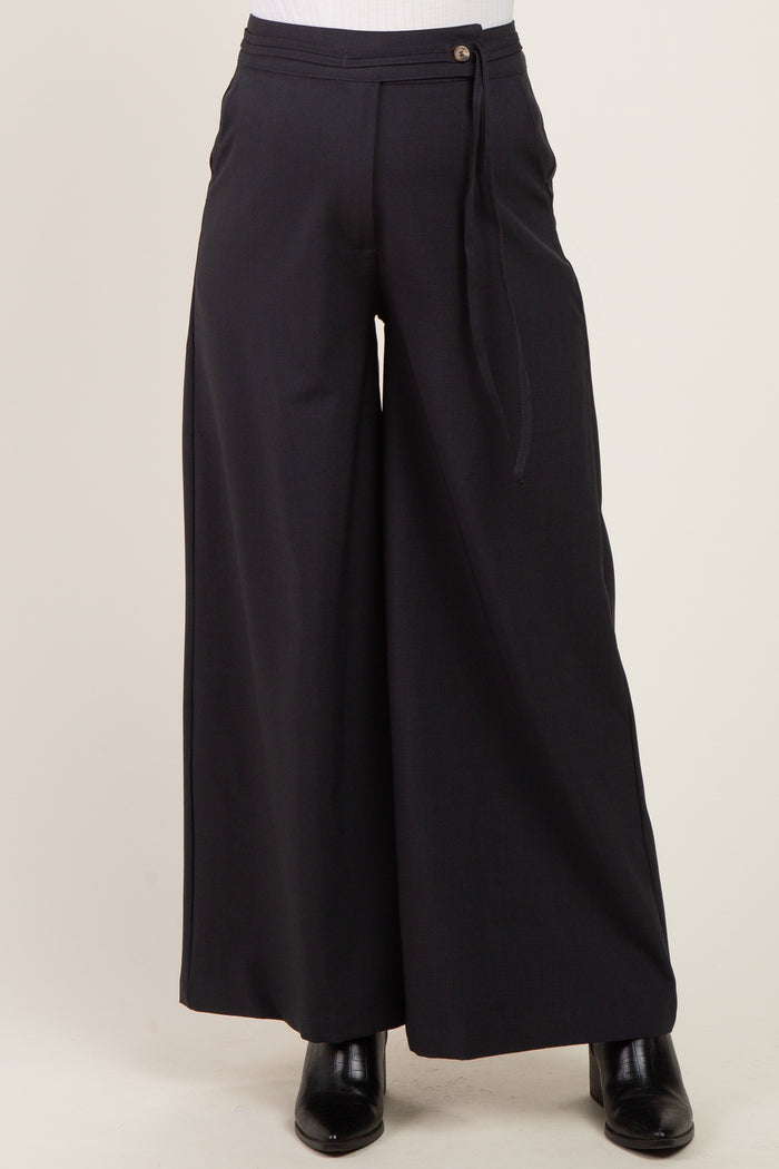 maternity wear black wide-leg pants with a tied waistband and front button detail