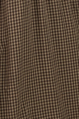 brown and beige gingham plaid fabric with a textured surface