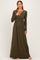 woman wearing an olive green long sleeve maxi dress with a wrapped bodice and pleated skirt