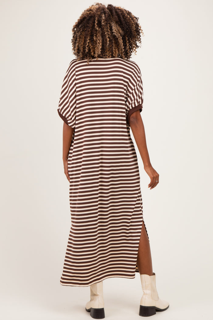 woman wearing a brown and white striped maternity maxi dress with short sleeves and side slits