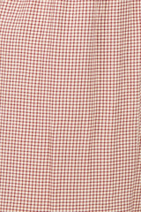 maternity wear in a red and white checkered pattern with a pleated design