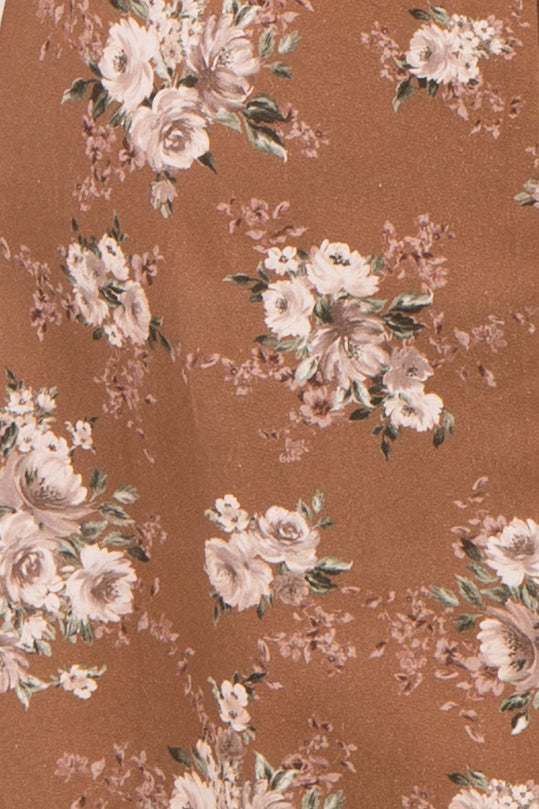 maternity wear floral print fabric in warm brown tones with pink and cream roses