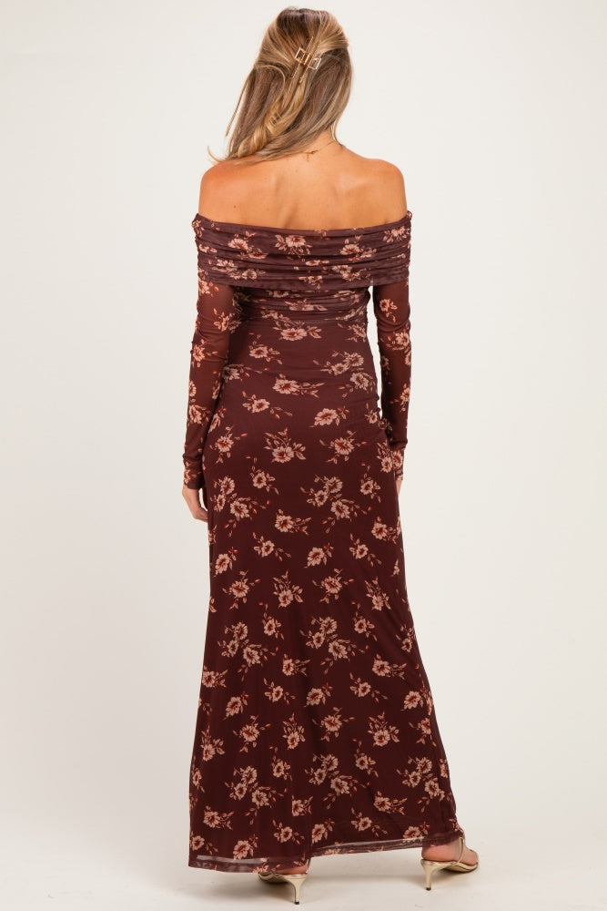 woman wearing a burgundy off-the-shoulder floral maternity dress with long sleeves, showcasing a fitted silhouette from the back