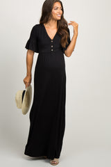 woman wearing a black short sleeve button front maternity maxi dress with ruffle sleeves