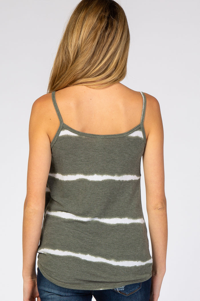 Back view of a woman wearing an olive green and white striped spaghetti strap tank top
