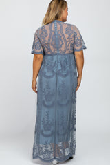 maternity plus wear woman wearing a sheer blue embroidered maxi dress from the back