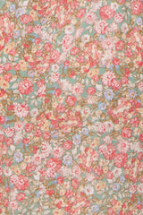 floral print fabric in pastel colors featuring pink, blue, and green hues, suitable for women's plus clothing