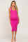 woman wearing a pink ribbed maternity dress that fits snugly over her baby bump