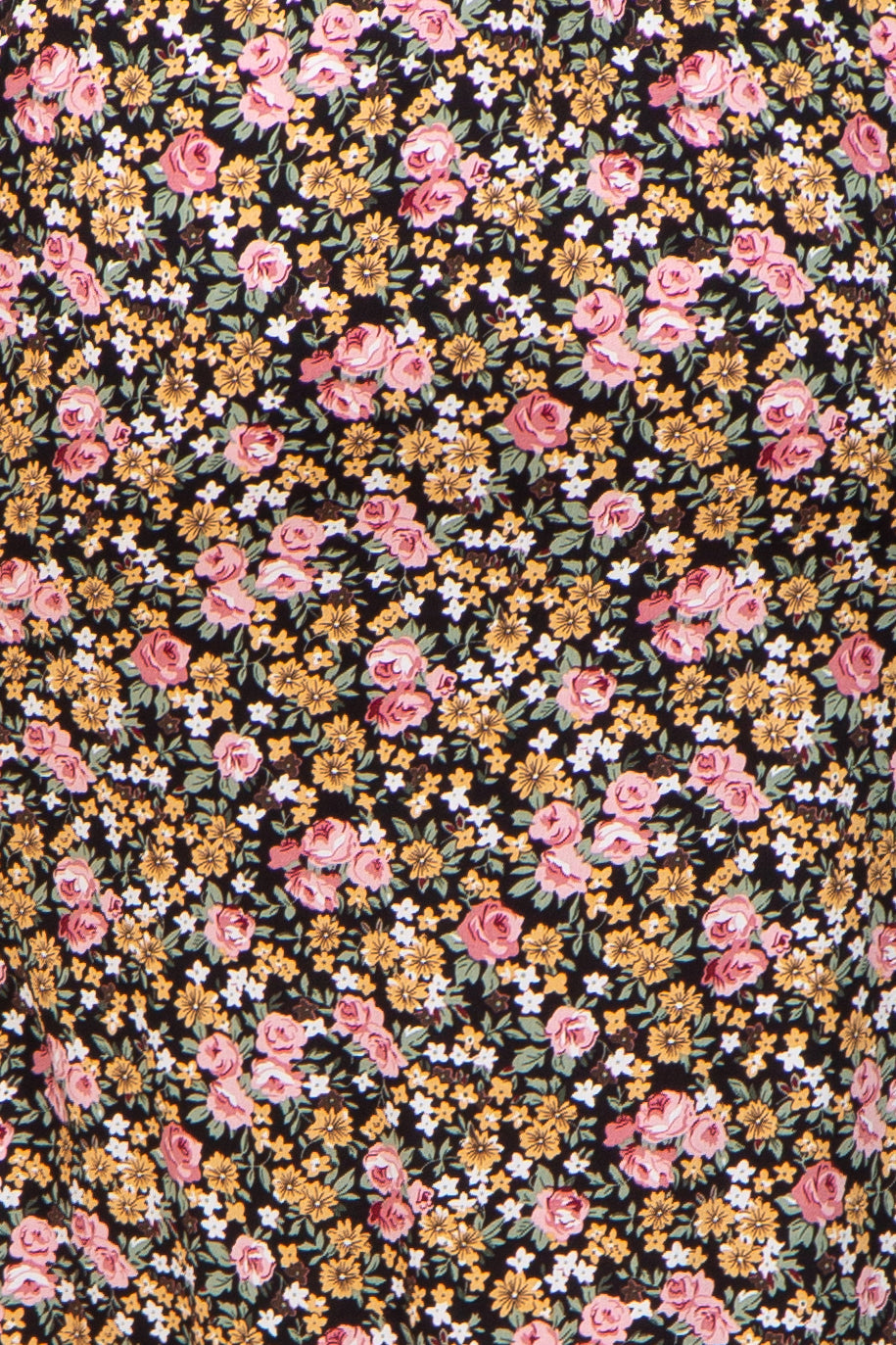 maternity wear in a black fabric with a floral pattern featuring pink roses and yellow flowers